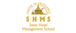 Лого Swiss Hotel Management School  (SHMS) Caux — Школа отельного менеджмента в Ко